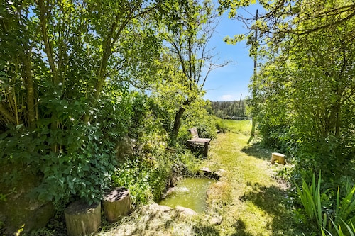 Casa de vacaciones 'La Cirera' con vistas a la montaña, piscina compartida y Wi-Fi