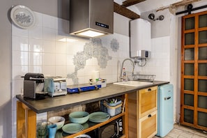 Fridge, microwave, stovetop, coffee/tea maker