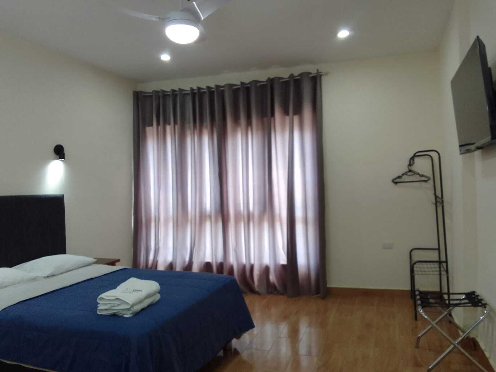 Standard Room, City View | Down comforters, desk, laptop workspace, blackout drapes