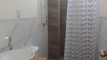 Standard Room, City View | Bathroom | Shower, rainfall showerhead, hair dryer, towels