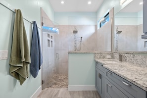 Shower, hair dryer, towels