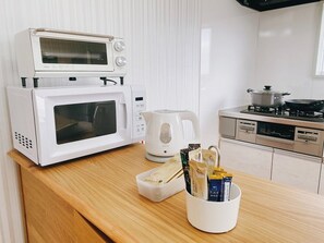 Fridge, microwave, stovetop, cookware/dishes/utensils