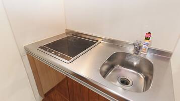 Fridge, microwave, stovetop, cookware/dishes/utensils