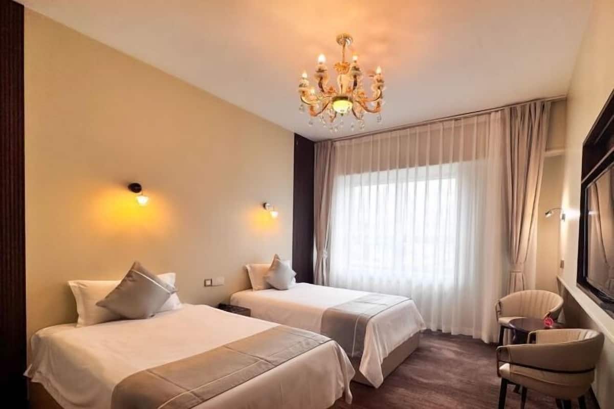 Minibar, desk, laptop workspace, blackout curtains