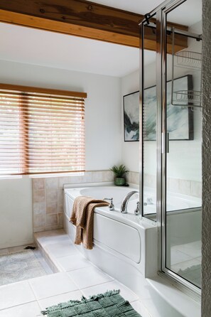 Jetted tub, hair dryer, towels, soap