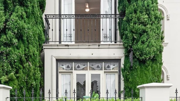 A two-story house with a balcony, large windows, and a white facade. - `Beach Side` Warrnambool CBD (Warrnambool)