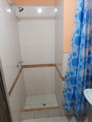 Shower, towels, soap, toilet paper