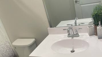 Hair dryer, towels, soap, toilet paper