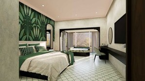 Quarto com cama, um sofá pequeno, janela com cortinas, espelho e televisão.