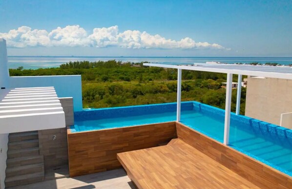 Enjoy a refreshing swim and take in the breathtaking ocean views from our rooftop pool.