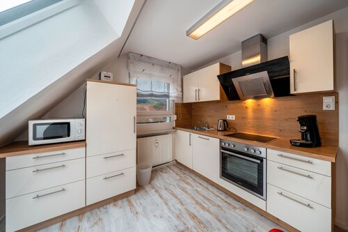 Appartement 'Ferienwohnung Burgblick' avec vue sur les montagnes, jardin partagé et Wi-Fi