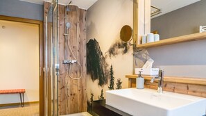 Ducha, secador de pelo y toallas