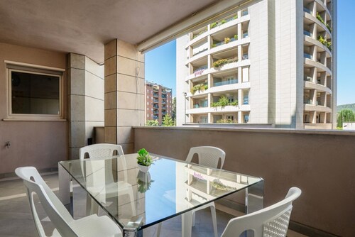 GuestHost - Brand new 92 sqm apartment with two balconies, perfect for 6 people, located on the first floor of a modern building with lift, inside a splendid gated residence.The accommodation is located in a quiet residential neighborhood of Perugia, a 1