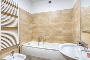 Shower, jetted bath, hair dryer, bidet