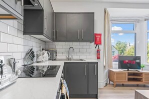 Fridge, microwave, oven, toaster - Cedar View – 2 Bed Apartment (Newport)