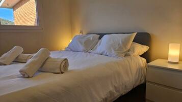 1 dormitorio, tabla de planchar con plancha, cuna de viaje y wifi gratis