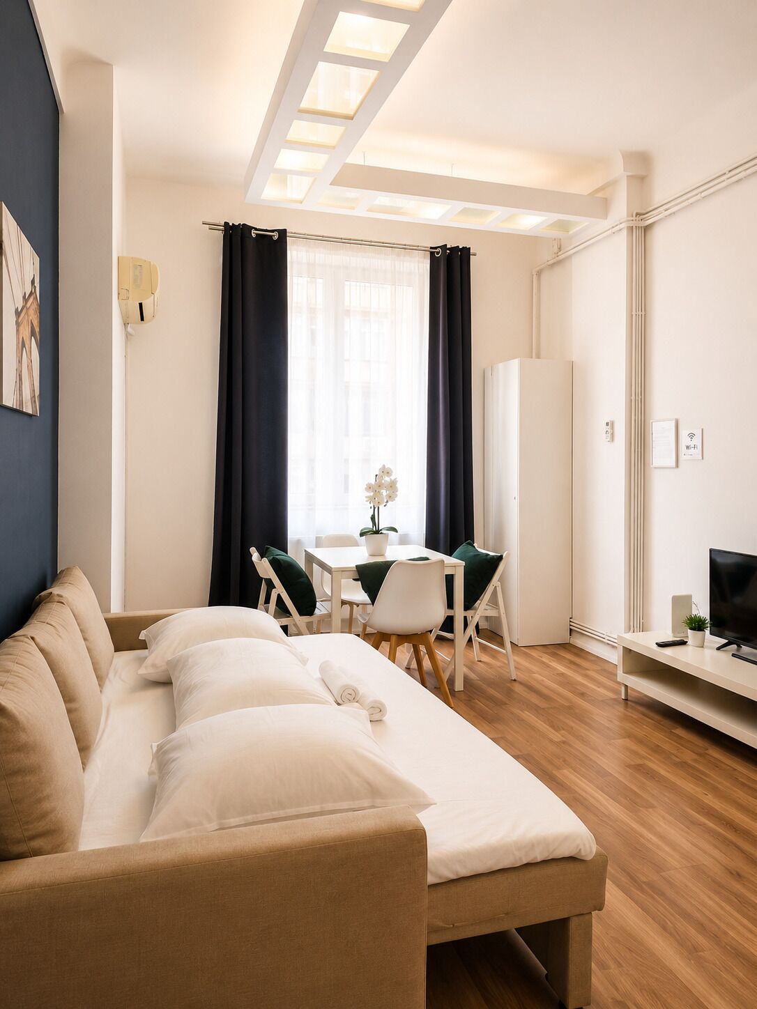 Apartment | Living area | 81-cm Smart TV with satellite channels, offices