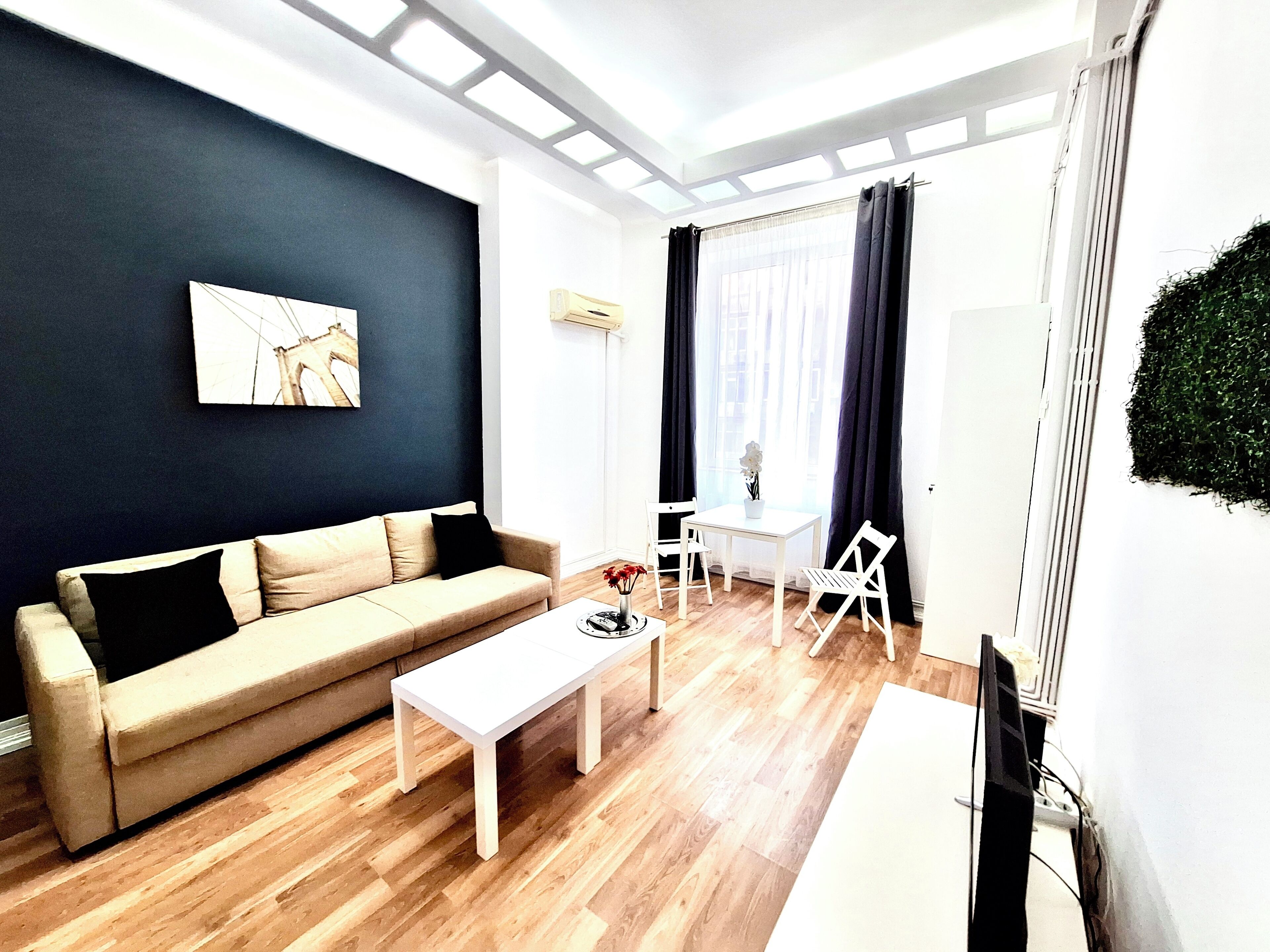 Apartment | Living area | 81-cm Smart TV with satellite channels, offices