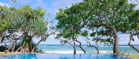 Outdoor pool, pool umbrellas, pool loungers