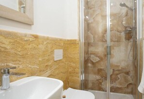 Regadera, secadora de cabello, bidet 