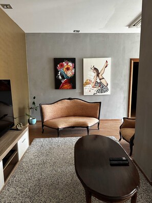 Apartment (Two-Bedroom Apartment with Terrace an) | Living room | 32-inch flat-screen TV with satellite channels