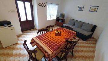 House (Three Bedroom Holiday Home with Terra) | Living room | 32-inch flat-screen TV with satellite channels