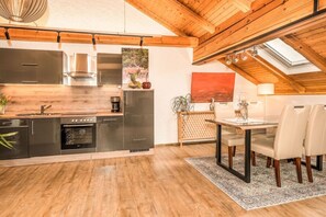 Fridge, stovetop, dining tables