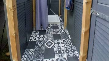 Shower, towels, toilet paper