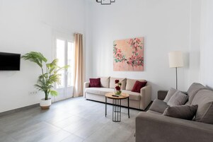 Premium Apartment, 1 Queen Bed with Sofa bed | Living area | Flat-screen TV