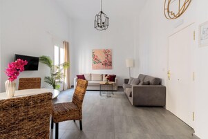 Premium Apartment, 1 Queen Bed with Sofa bed | Living area | Flat-screen TV