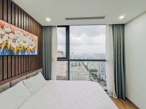 Deluxe-lejlighed - 2 soveværelser - balkon - byudsigt (High Floor (15th floor above)) | 1 soveværelse, premium-sengetøj, senge med topmadrasser