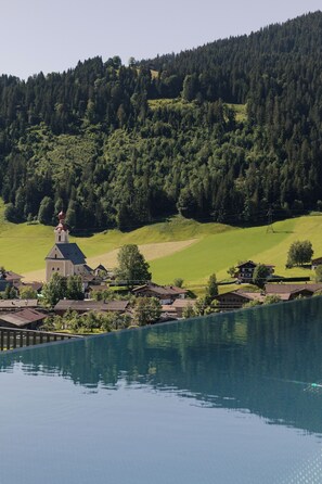 Outdoor pool, a heated pool - East 01 - Going Triple A Apartments (Going am Wilden Kaiser)