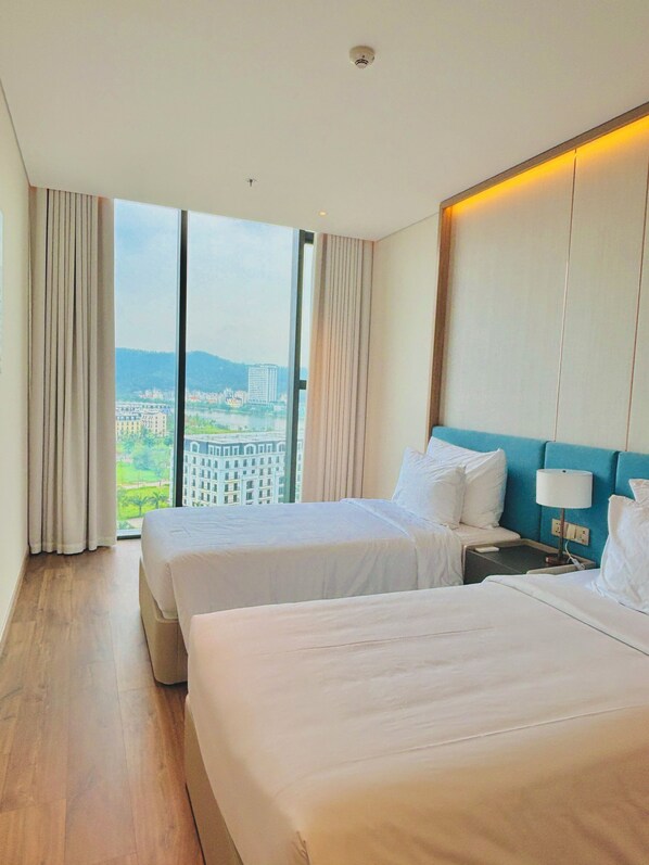 Appartement Familial, balcon, vue océan | Literie de qualité supérieure, couette en duvet d'oie