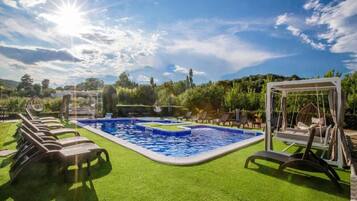 Seasonal outdoor pool, pool umbrellas, sun loungers