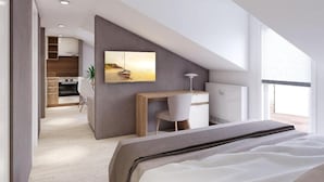 A modern bedroom with a large bed, a desk, and a view of the beach. - Apartments Villa Subic (Rab)