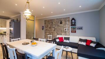 Villa (Three-Bedroom Villa with Terrace and ) | Dining room
