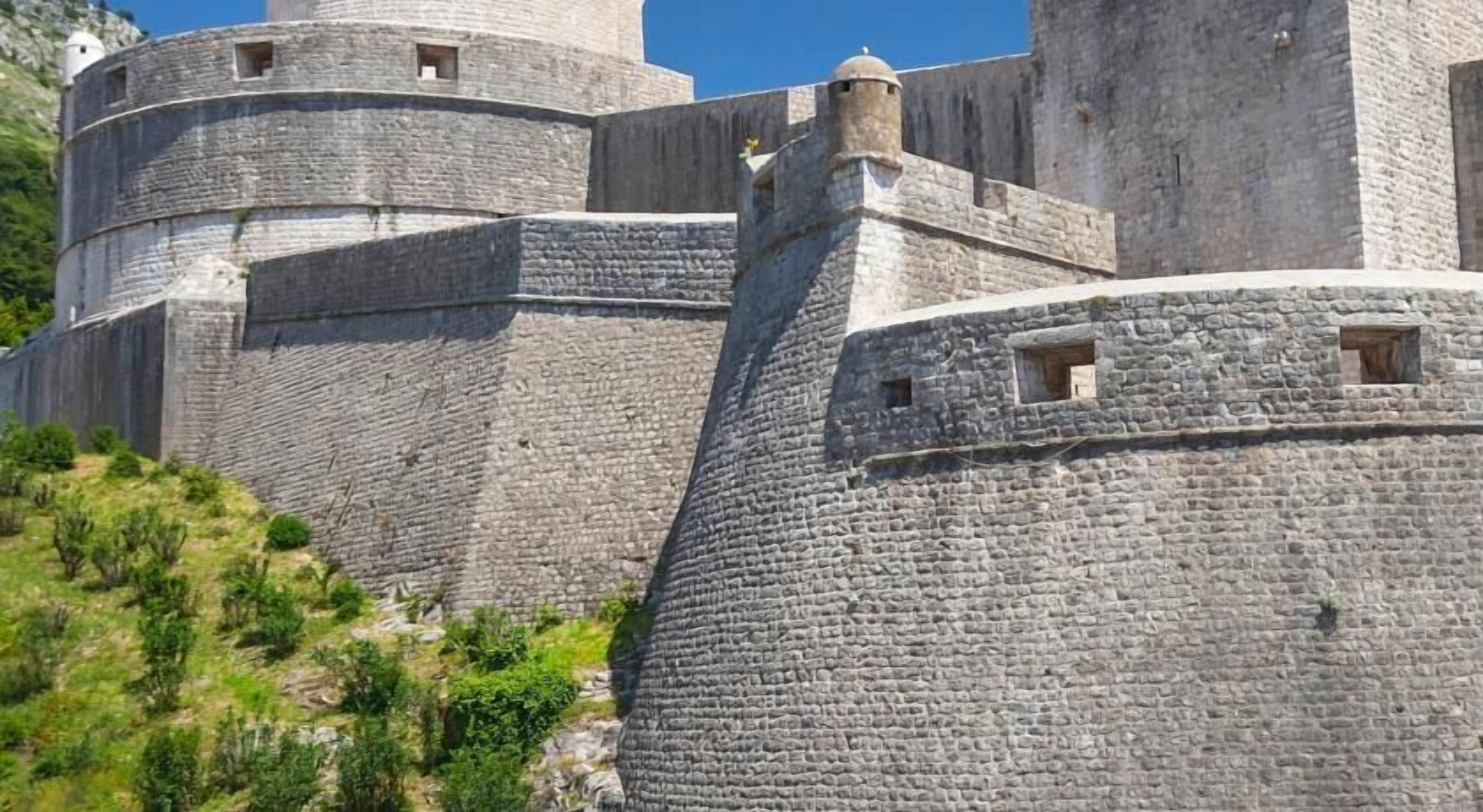A large stone fortress with multiple towers and battlements.