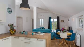 Apartment (Three Bedroom Apartment with Balcony) | Private kitchen | Fridge