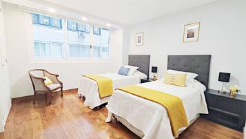 4 bedrooms, desk, iron/ironing board, travel crib