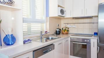 Apartment (Two Bedroom Apartment with Balcony an) | Private kitchen | Fridge