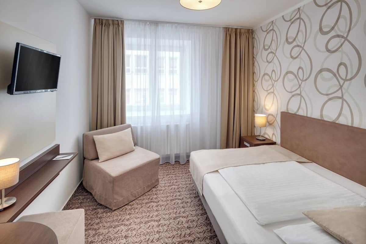 Chambre Simple Standard, vue ville | Espace de travail pour ordinateur portable, Wi-Fi gratuit