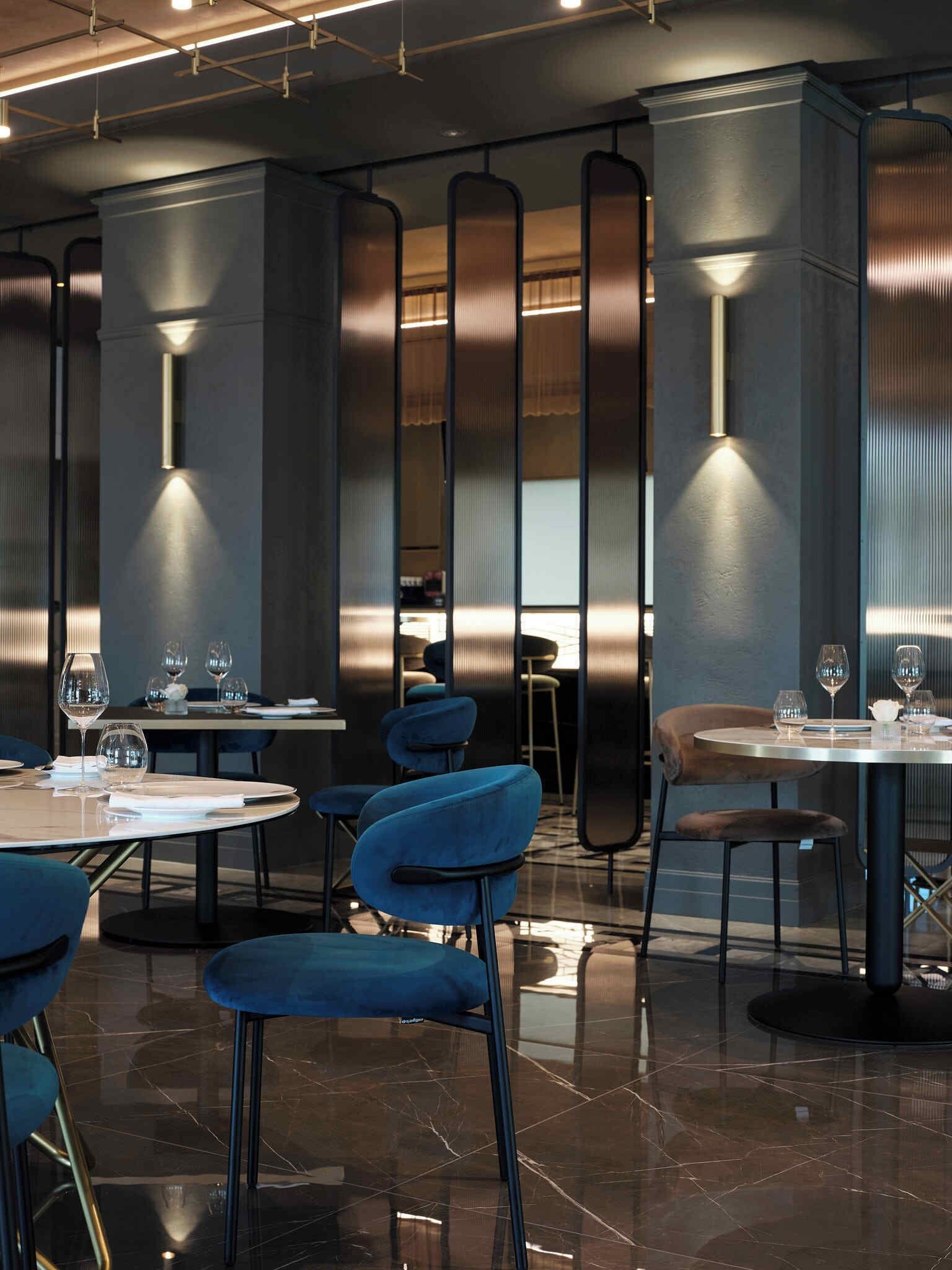 A modern restaurant interior with round tables, blue upholstered chairs, and vertical light fixtures.