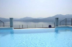 Outdoor pool - Lake Maggiore • Panoramic lake view & large balcony and pool | 2 bedrooms (Piemonte)