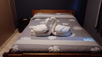 Family Apartment, 2 Bedrooms, Pool View, Poolside | In-room safe, individually decorated, individually furnished