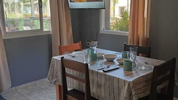 Family Apartment, 2 Bedrooms, Pool View, Poolside | Private kitchen | Full-size fridge, microwave, oven, cookware/dishes/utensils