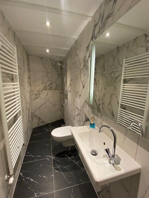 Shower, towels, soap, shampoo