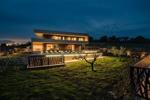 Situated in a serene, setting, this two-story building offers a tranquil atmosphere.