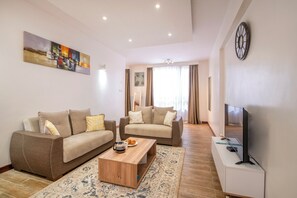 Standard Apartment, City View | Living area - The Enclave Revamp by YourHost (Nairobi)