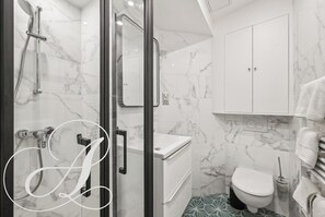 Shower, hair dryer, towels, soap