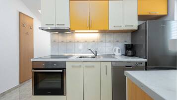 Apartment (One Bedroom Apartment with Balcony an) | Private kitchen | Fridge